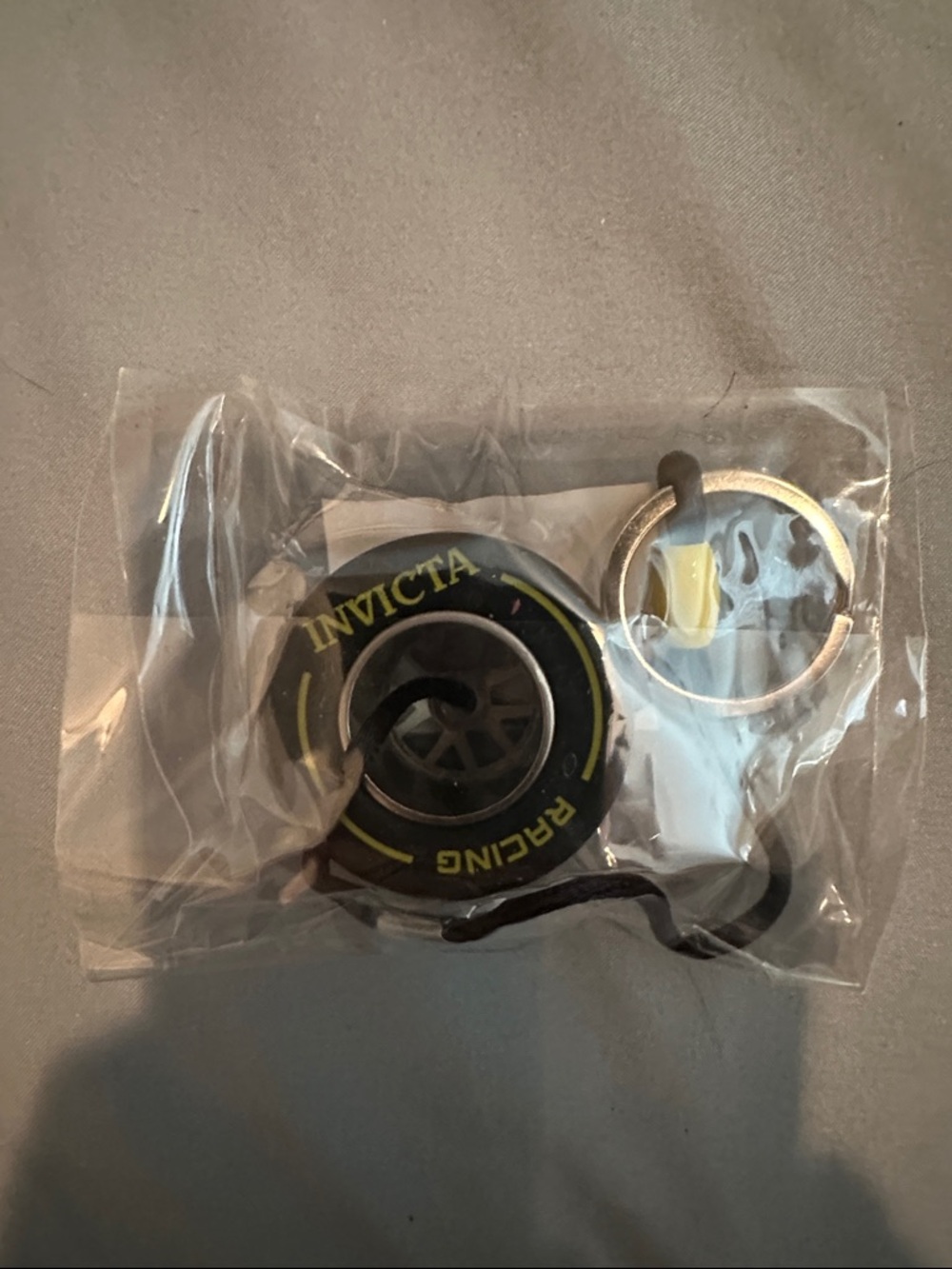 Invicta Racing F1 Rubber Tire keychain - Picture 2 of 4